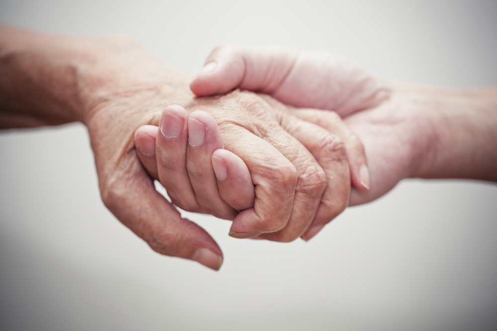 Holding hands | Adams County Office for Aging 